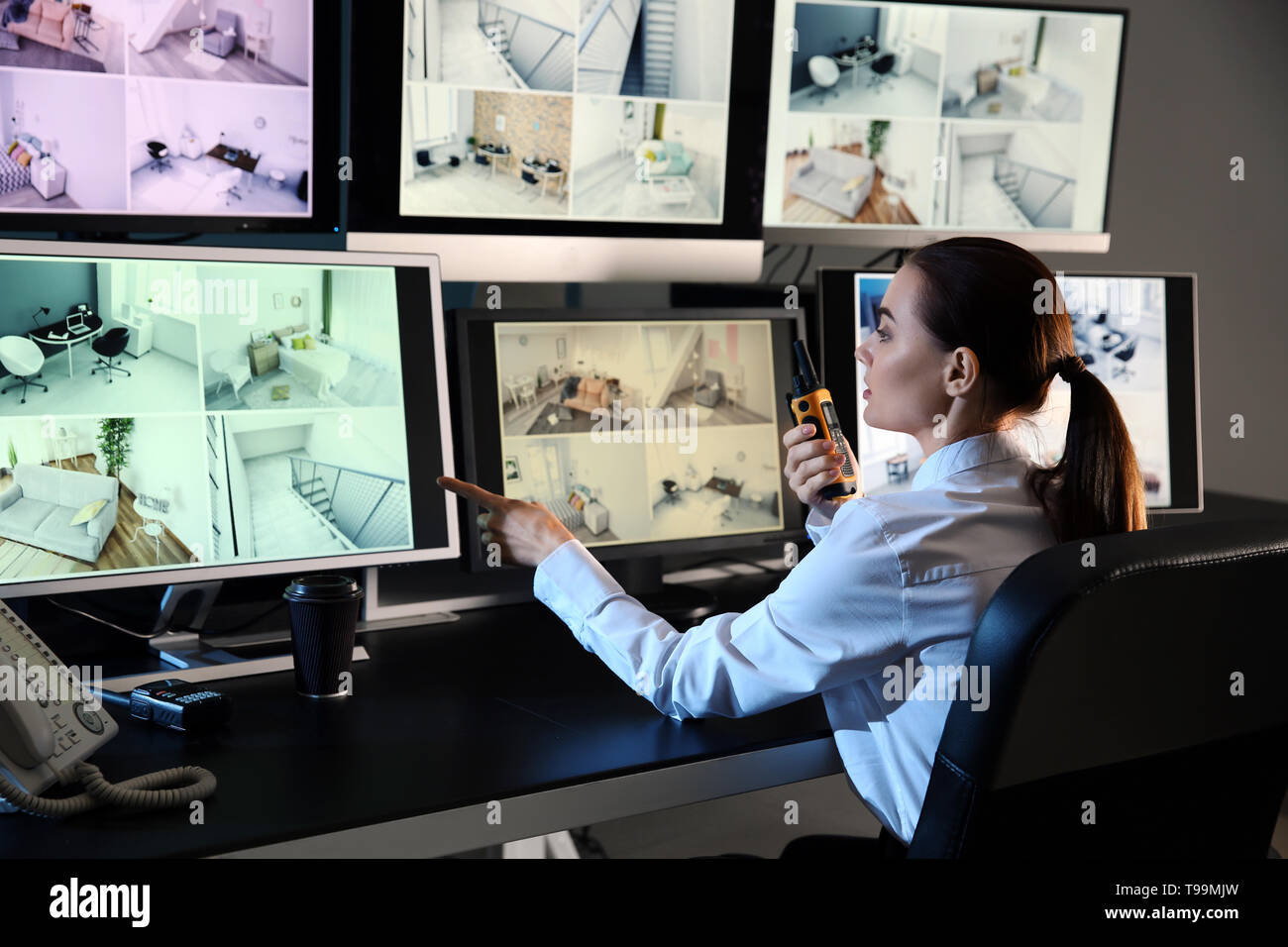 Security Guard Monitoring Modern Cctv Cameras In