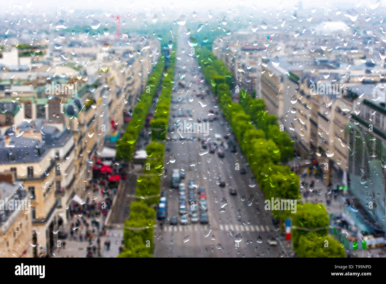 Paris during heavy Rain, raining Day in Paris, Drops on the window Stock Photo