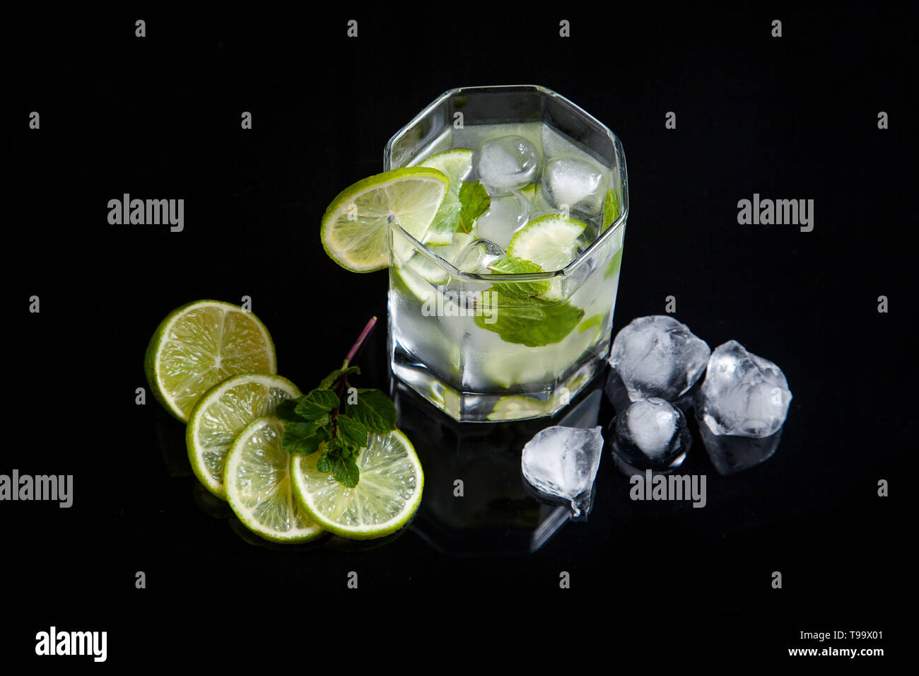 Mojito summer beach refreshing tropical cocktail in glass with soda