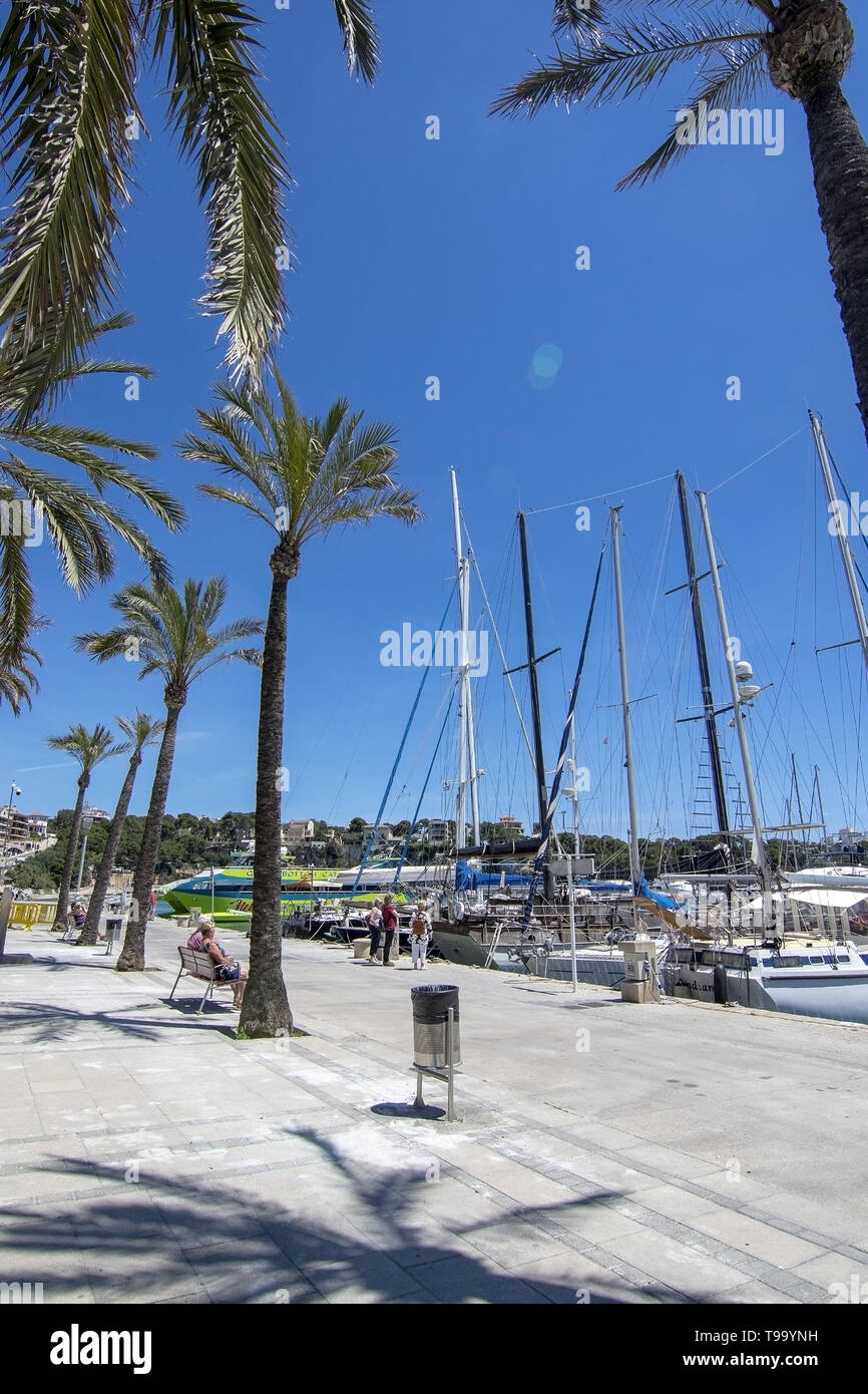 PORTO CRISTO, MALLORCA, SPAIN - MAY 16, 2019: Harbor area with moored small boats on a sunny day on May 16, 2019 in Porto Cristo, Mallorca, Spain. Stock Photo
