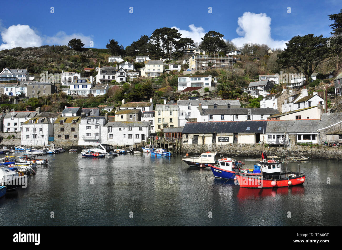 Boats in the small harbour at Polperro, Cornwall, England, UK Stock Photo