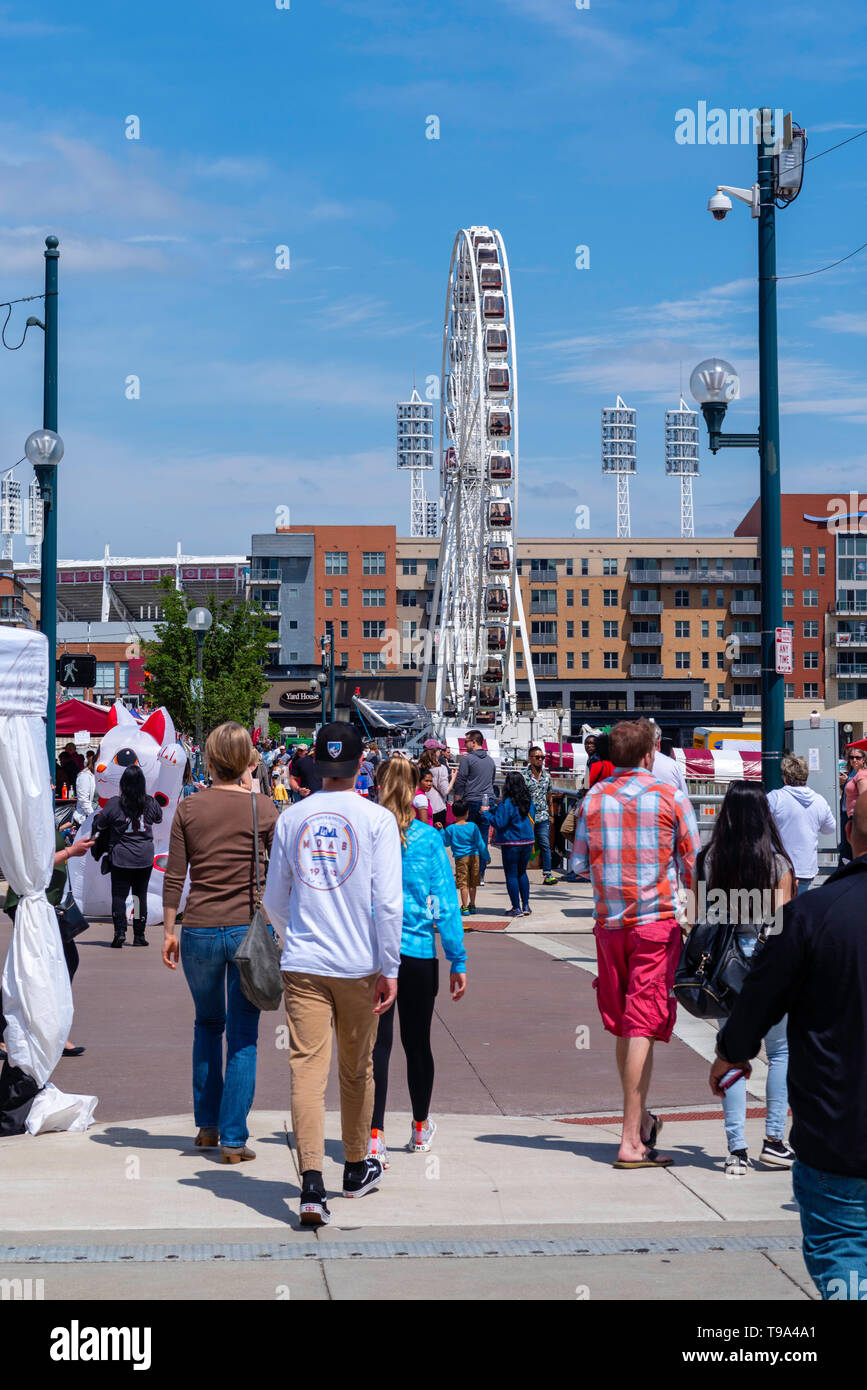People gather along the riverfront at Cincinnati's Asian American Food