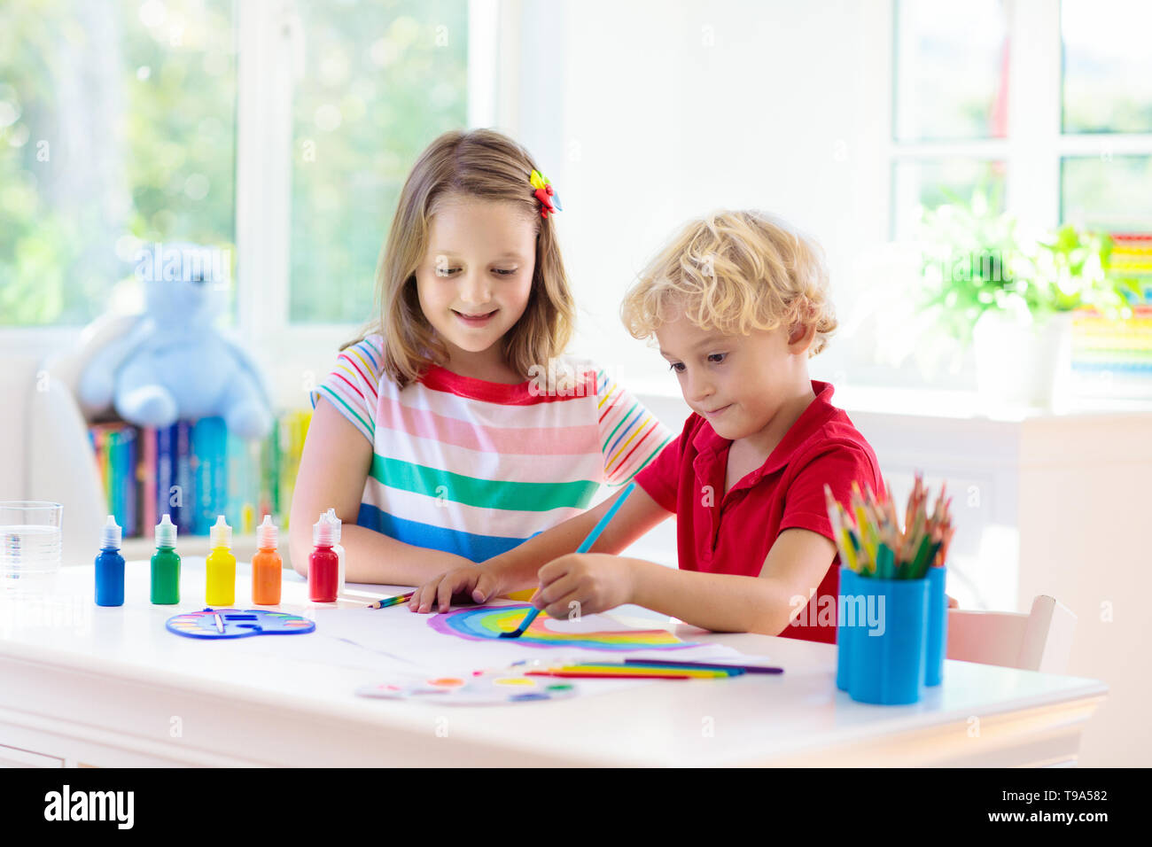 Kids Paint Child Painting In White Sunny Study Room Little Boy