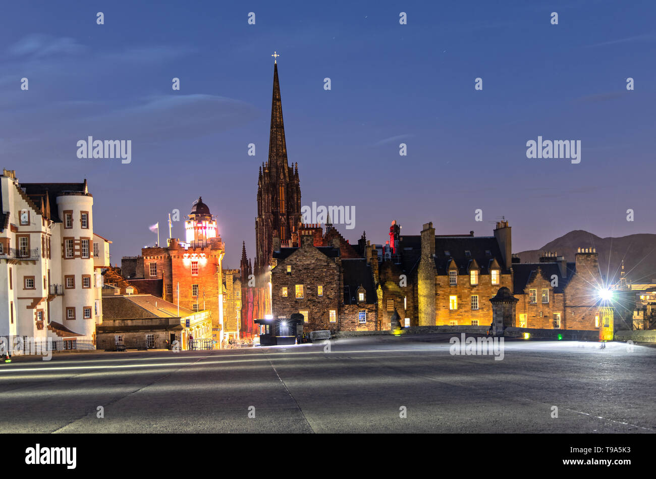 View over the Esplanade and the Hub in Edinburgh Scotland at Night Stock Photo