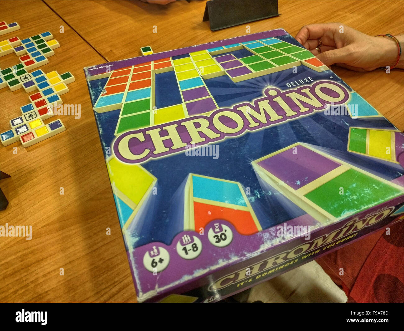 Turin, Piedmont, Italy. May 2019. Chromino strategy board game, inspired by  the domino game. Here the players have to match the colors two by two Stock  Photo - Alamy