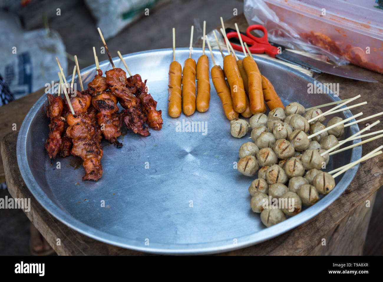 Grilled pork and chicken skewers for sale in Thailand. Stock Photo