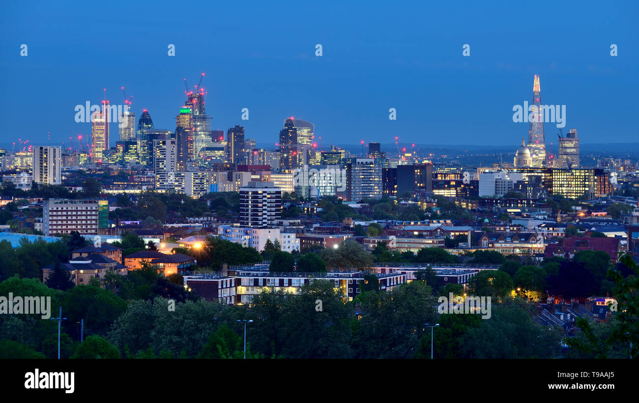 Photographed on the Parliament Hill after sunset, May 7 2018, Lloyd building, Gherkin, Walkie Talkie, Shard, St Paul Cathedral and Guy's Hospital etc Stock Photo
