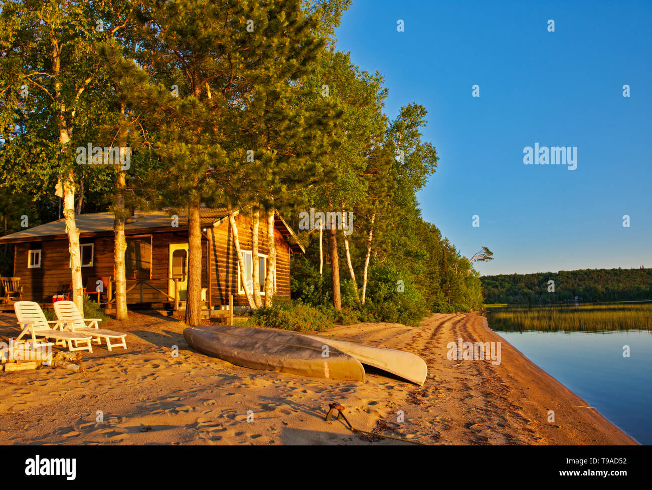 Cottage at sunrise on Lac des Sables Belleterre Quebec Canada Stock