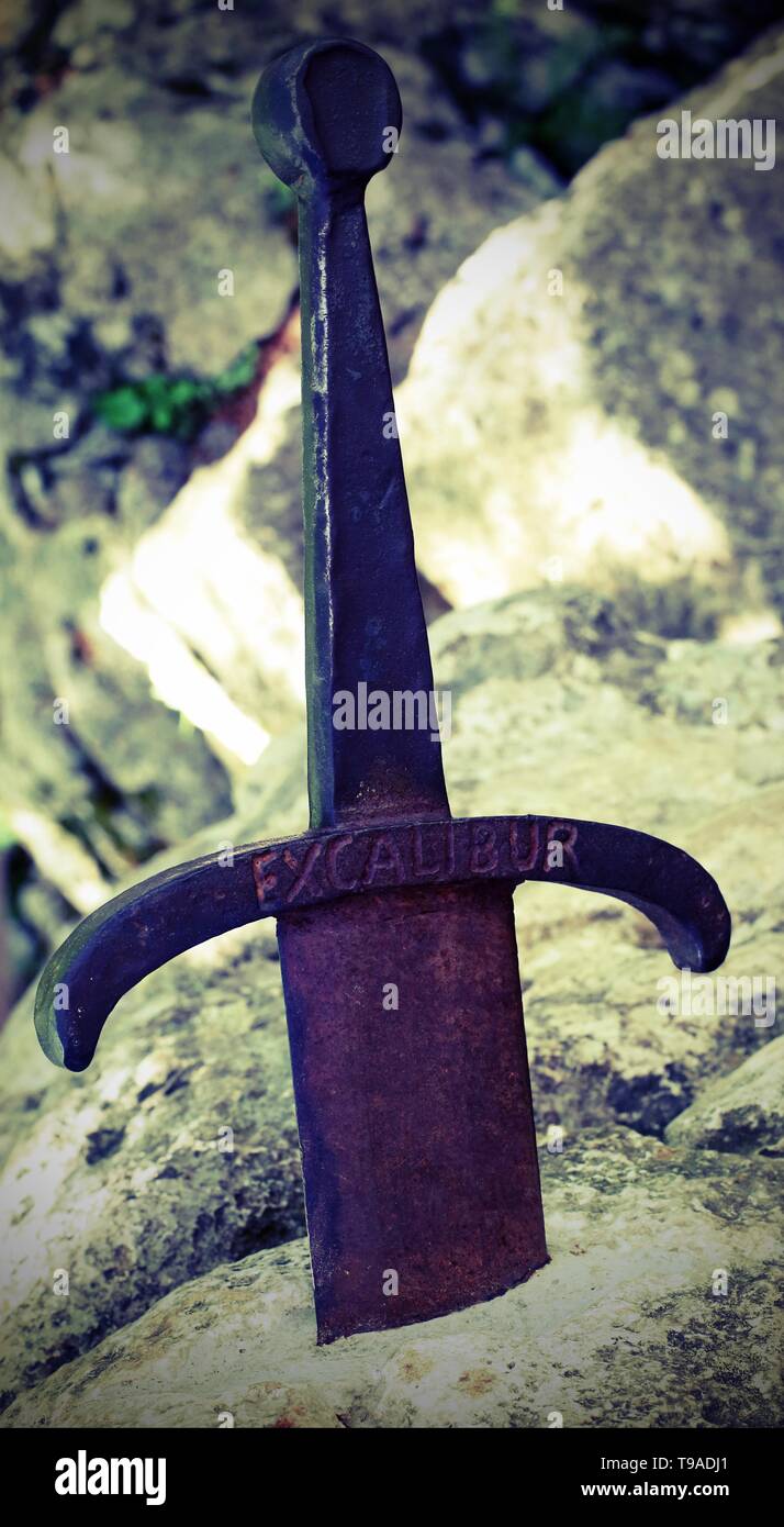 Excalibur is a legendary sword of King Arthur. With old toned effect Stock Photo Alamy