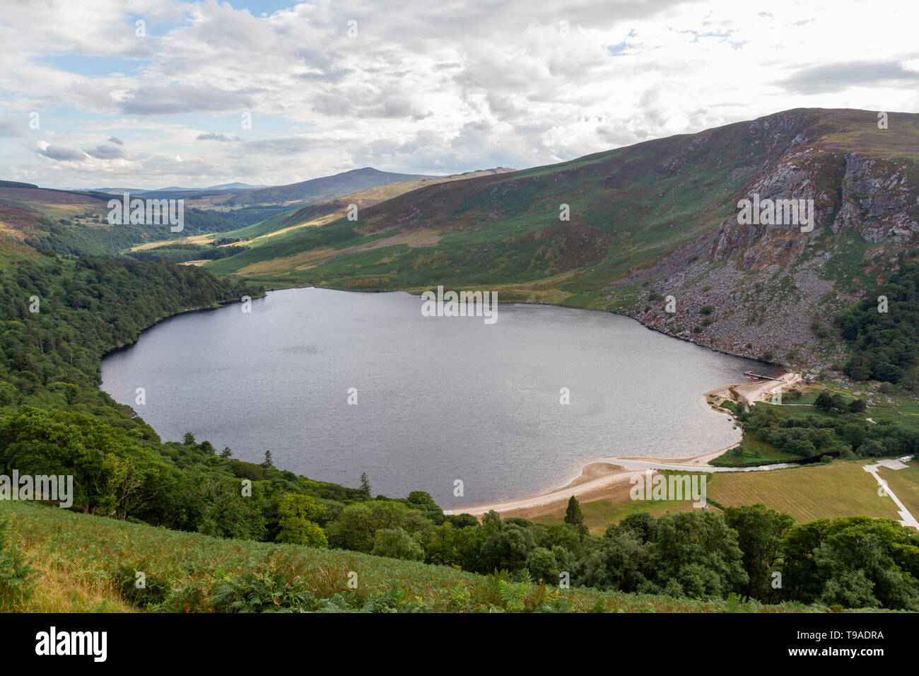 View past Lough Tay (The Guinness Lake) in the Wicklow Mountains National Park, Co. Wicklow, Eire. Stock Photo