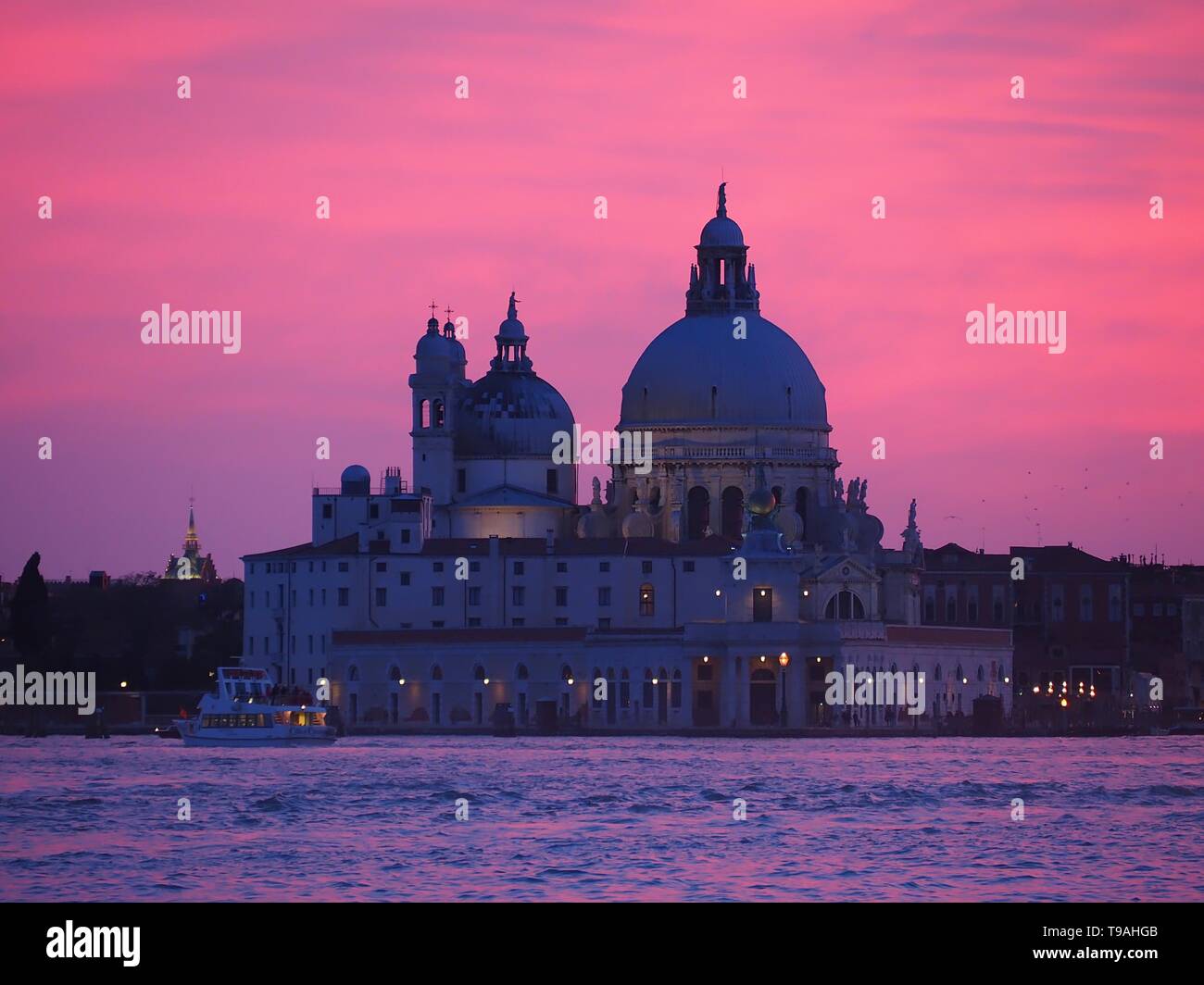 Colorful sunset in Venice with Maria della Salute Stock Photo