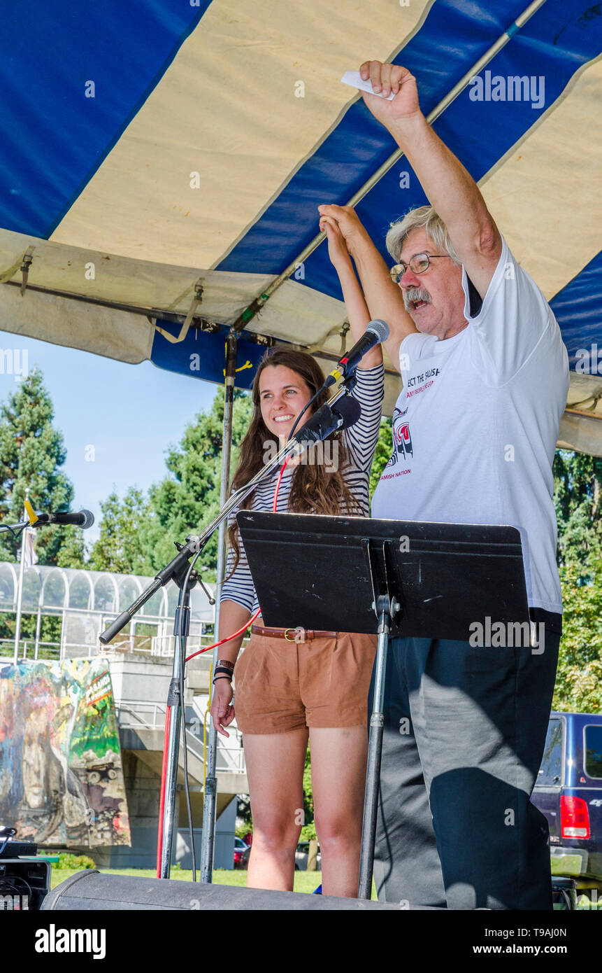 Brigette DePape, infamous former Senate Page, with Greenpeace co-founder Rex Weyler (of Tanker Free BC)  at the Salish Sea Fesival, Sept Sept 2, 2012, Stock Photo