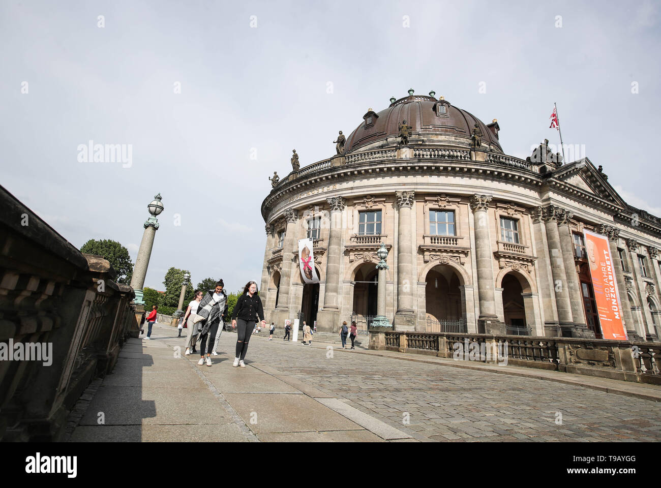 Beijing, Germany. 17th May, 2019. Pedestrians walk past the Bode Museum at Museum Island in Berlin, capital of Germany, on May 17, 2019. Museum Island, a UNESCO world heritage site, is the northern part of an island in the Spree river in Berlin. Its name comes from the complex of worldwide famous museums such as Altes Museum (Old Museum), Neues Museum (New Museum), Alte Nationalgalerie (Old National Gallery), Bode Museum and Pergamon Museum. May 18 marks the International Museum Day. Credit: Shan Yuqi/Xinhua/Alamy Live News Stock Photo