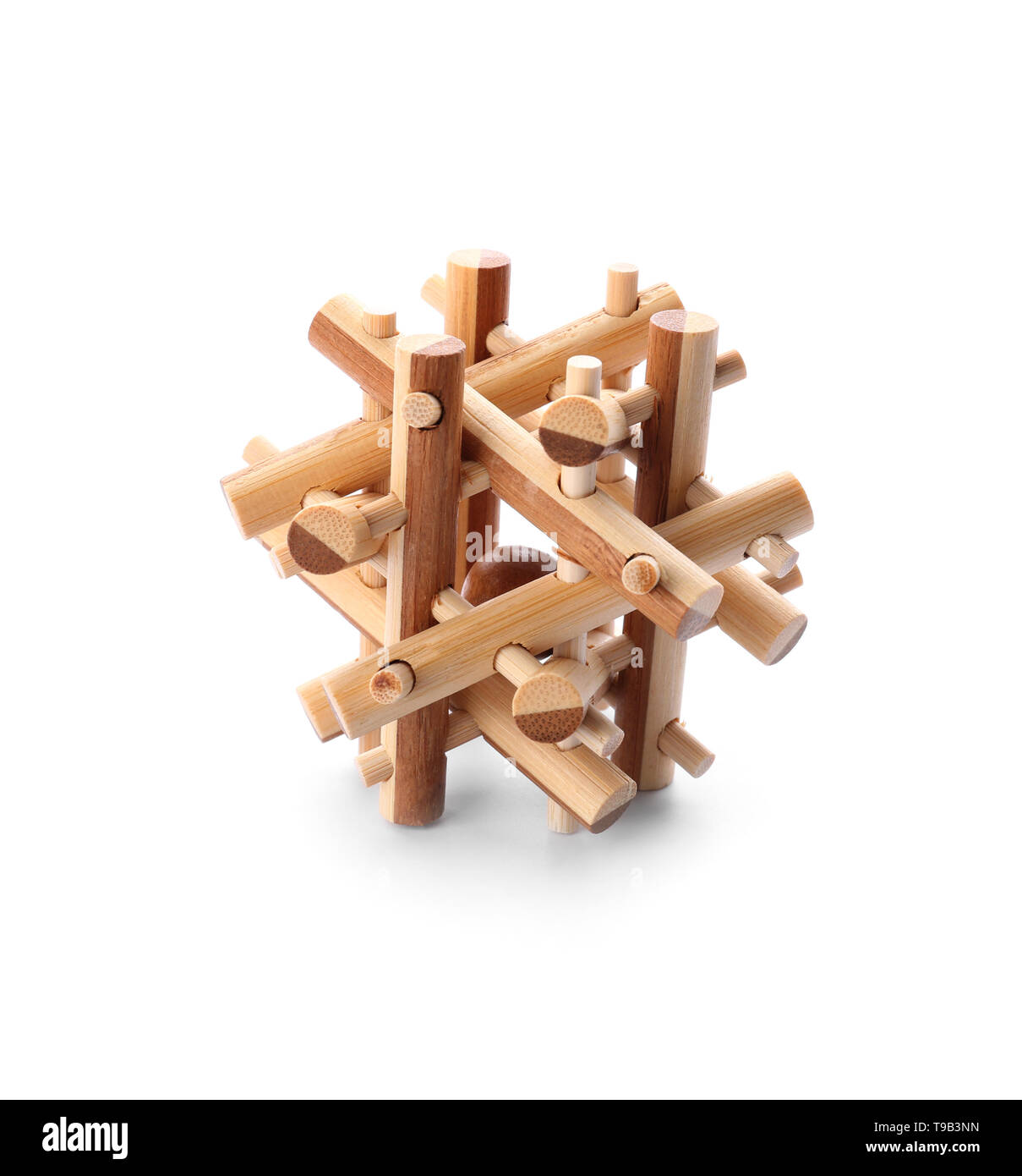 Wooden puzzle on white background Stock Photo