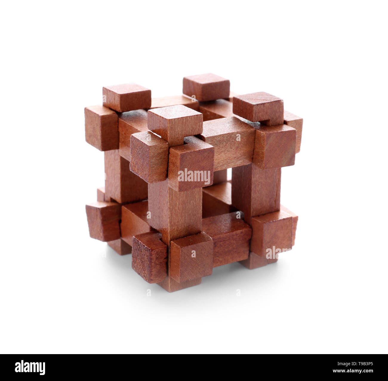 Wooden puzzle on white background Stock Photo