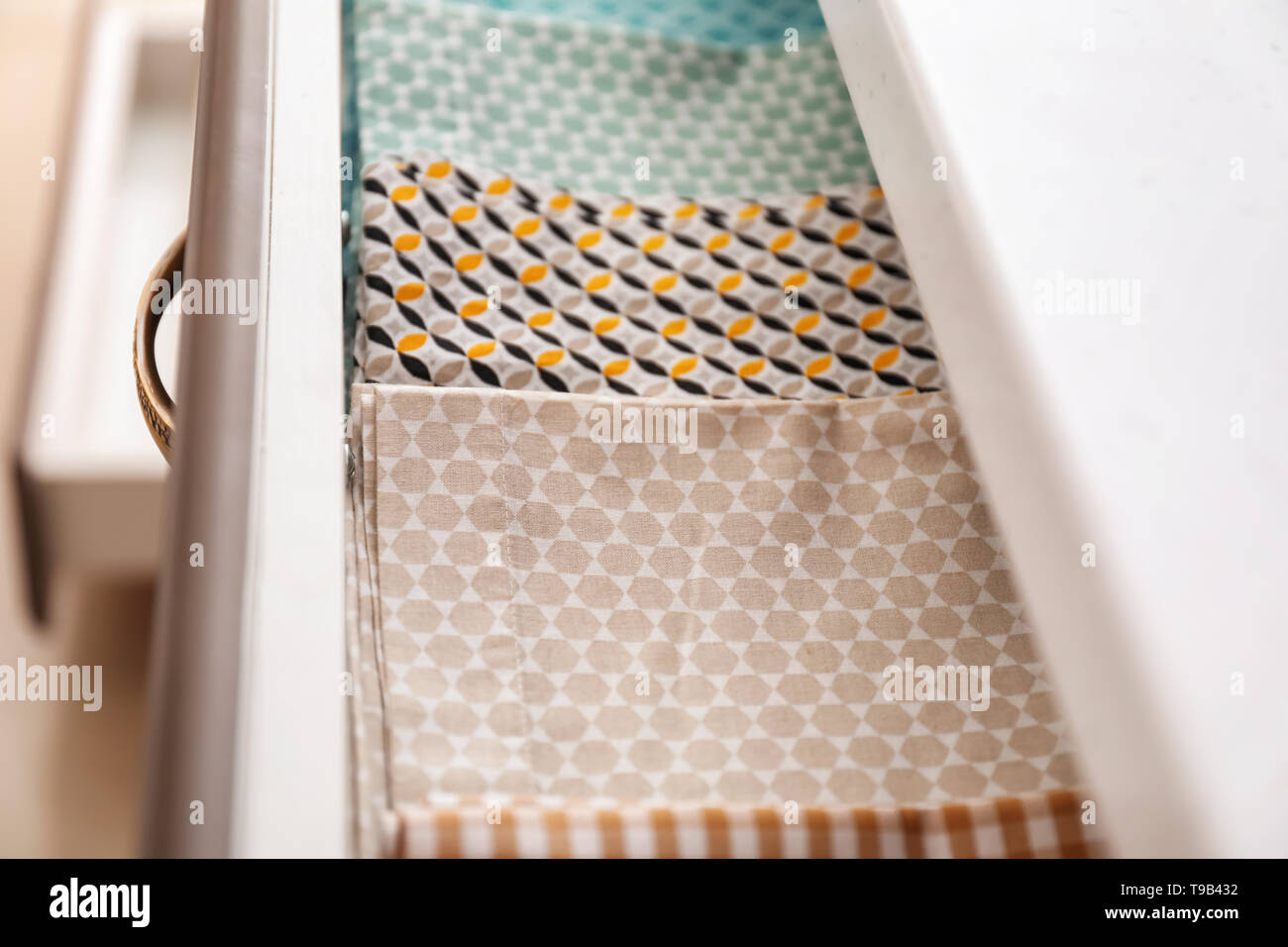 Clean kitchen towels in drawer Stock Photo Alamy