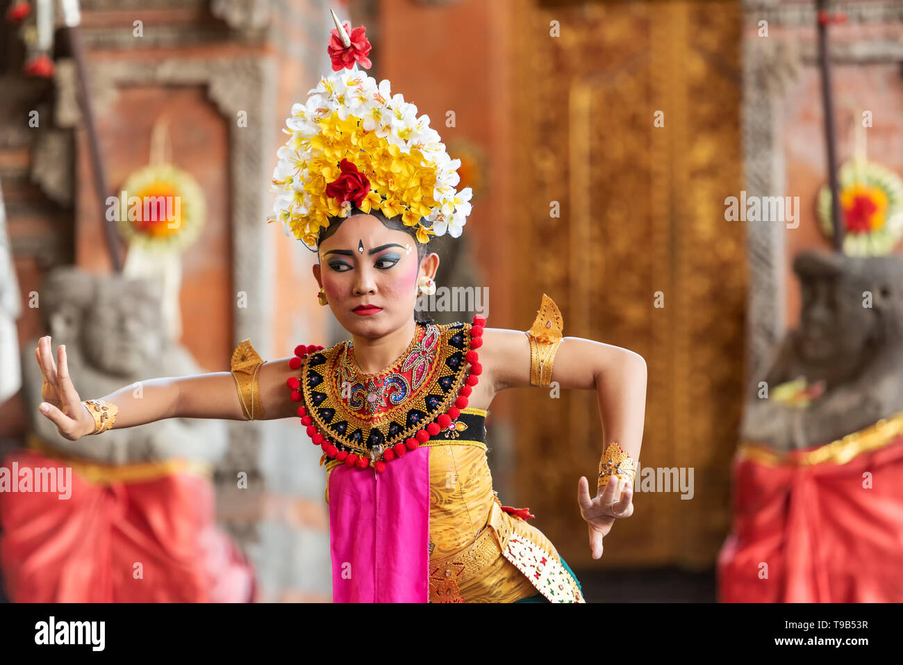 Denpasar, Indonesia - March 28, 2019: Legong dance performance, Balinese traditional dancing. Stock Photo