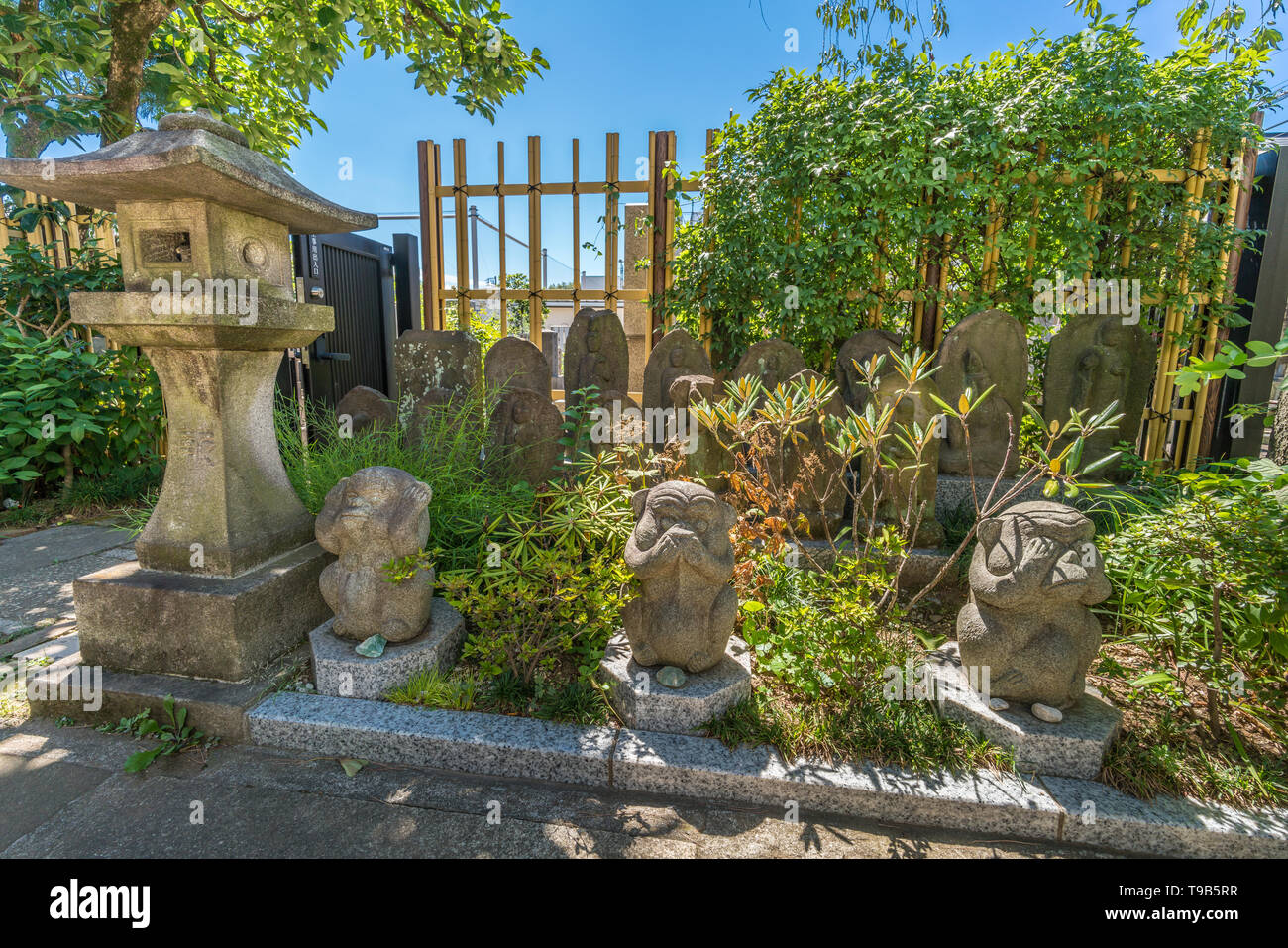 Tokyo, Minato Ward - August 17, 2018 : Sculpture of Tree monkeys. Mizaru covering his eyes  Kikazaru, covering his ears, and Iwazaru covering his mout Stock Photo