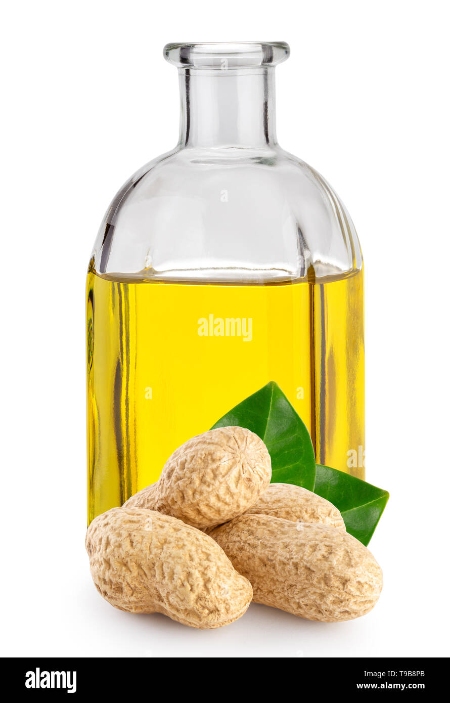 Peanuts with leaves and peanut oil in bottle Stock Photo Alamy