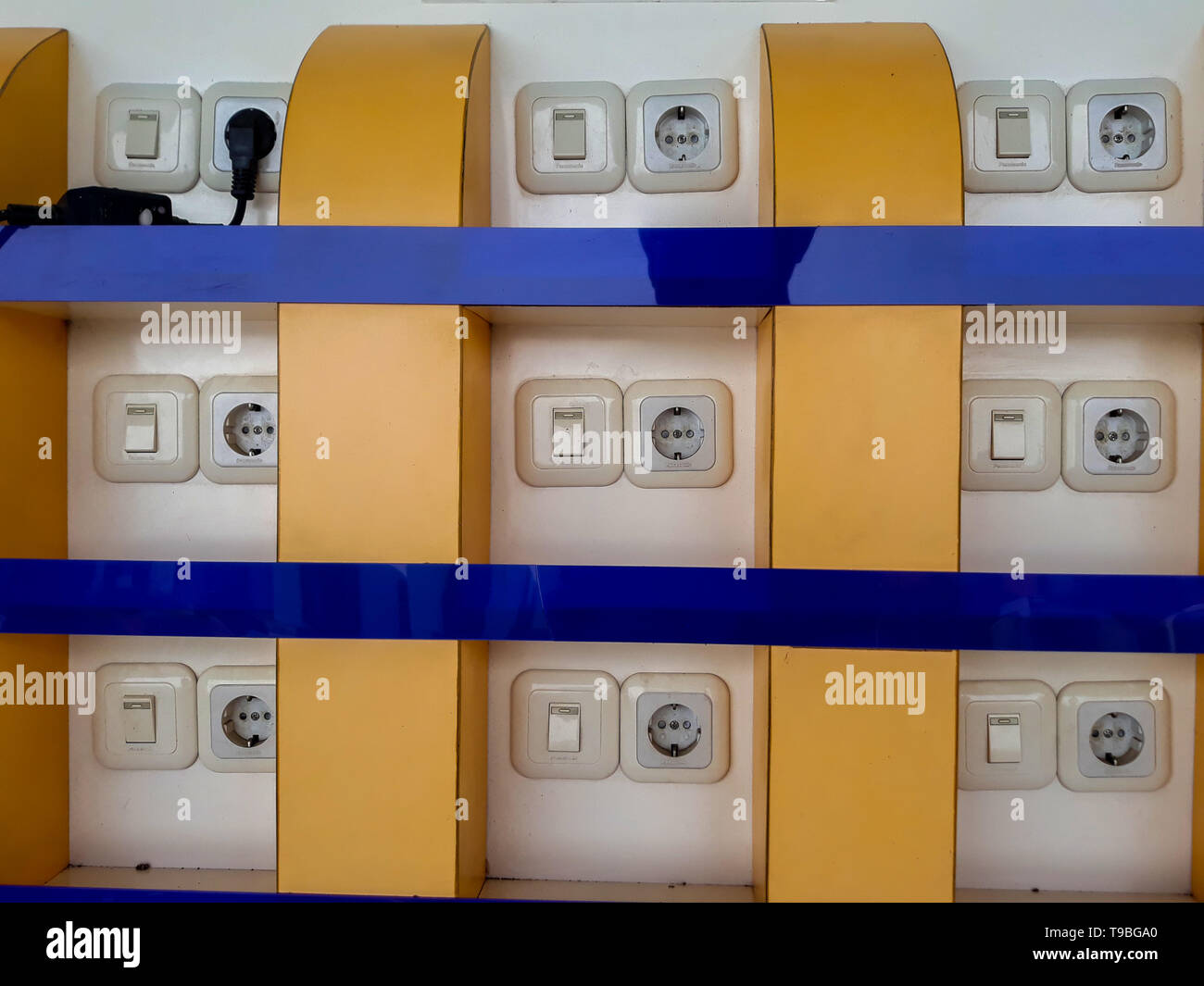 Electrical sockets on a wall on white background. PURWAKARTA, WEST JAVA,  INDONESIA. MAY 18, 2019 Stock Photo - Alamy