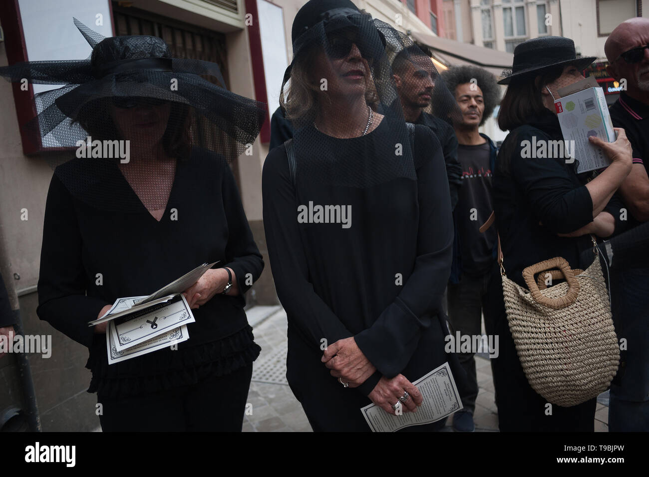 Women seen dressed in mourning clothes during the protest. The