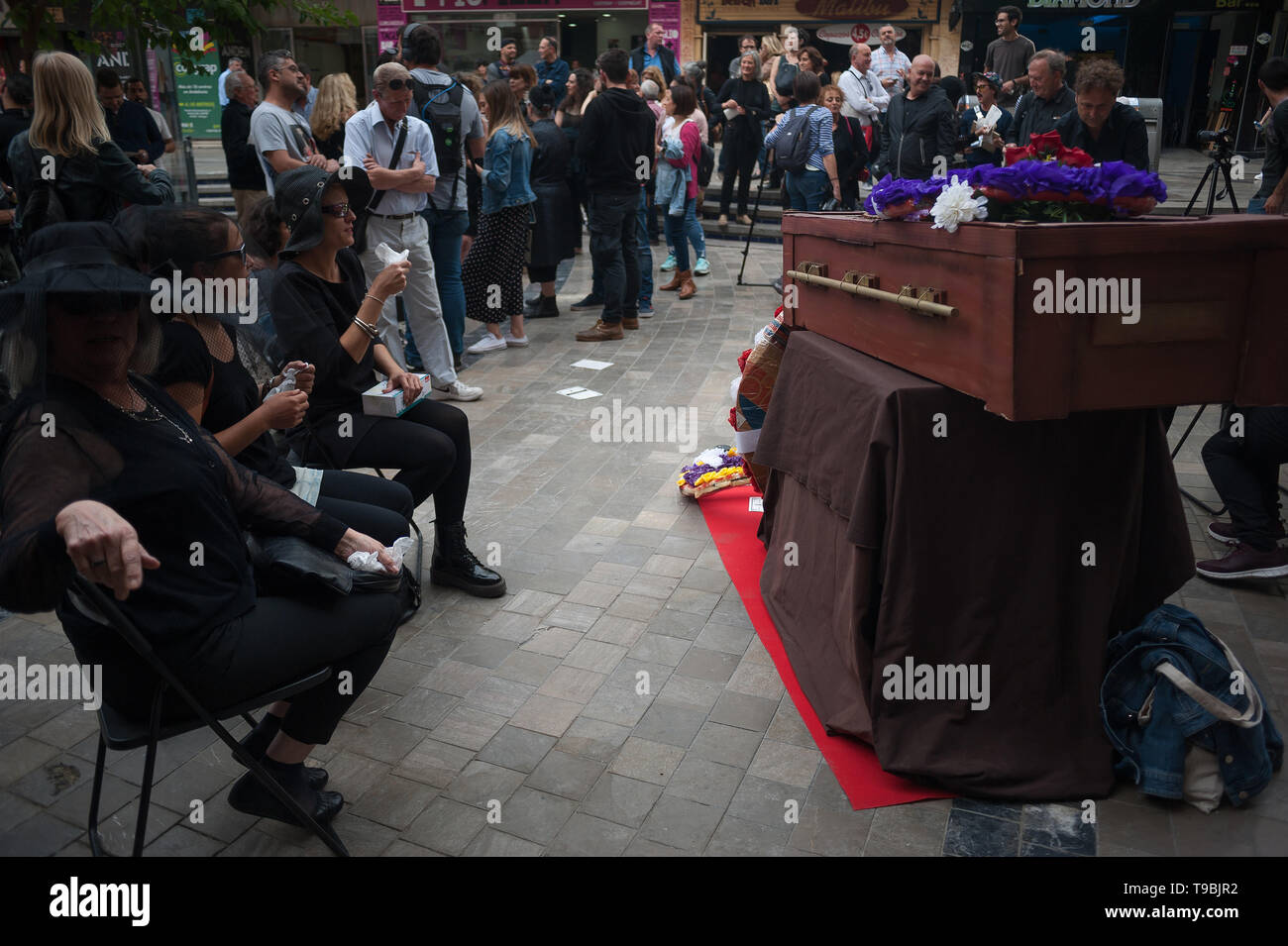 A funeral procession seen being held during the protest. The association of down town neighbours from Malaga have organized a symbolic funeral of a neighbour as part of a performance against the high cost of housing and rent because of property speculation in Malaga centre. Stock Photo