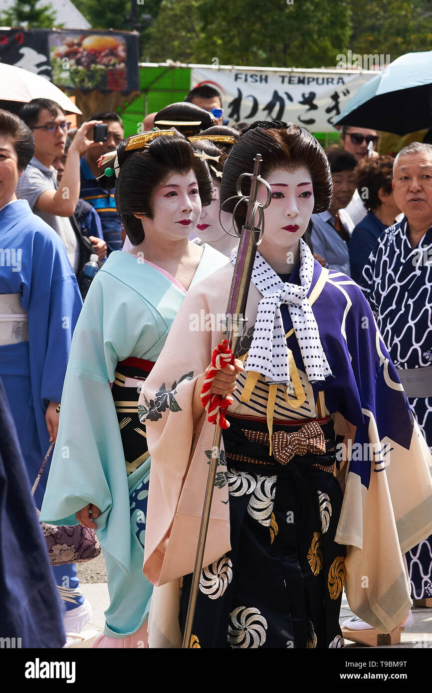 Japanese Female Kanabohiki Metal Rod Bearer With Shimada Momoware Hairstyle Leading A Procession During Sanja Matsuri Festival In Asakusa Tokyo Stock Photo Alamy