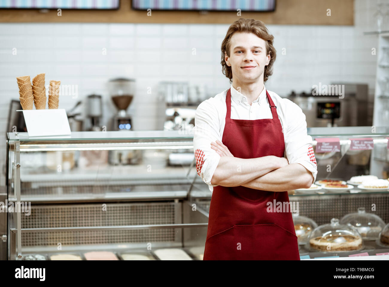 Red apron cafe hi-res stock photography and images - Alamy