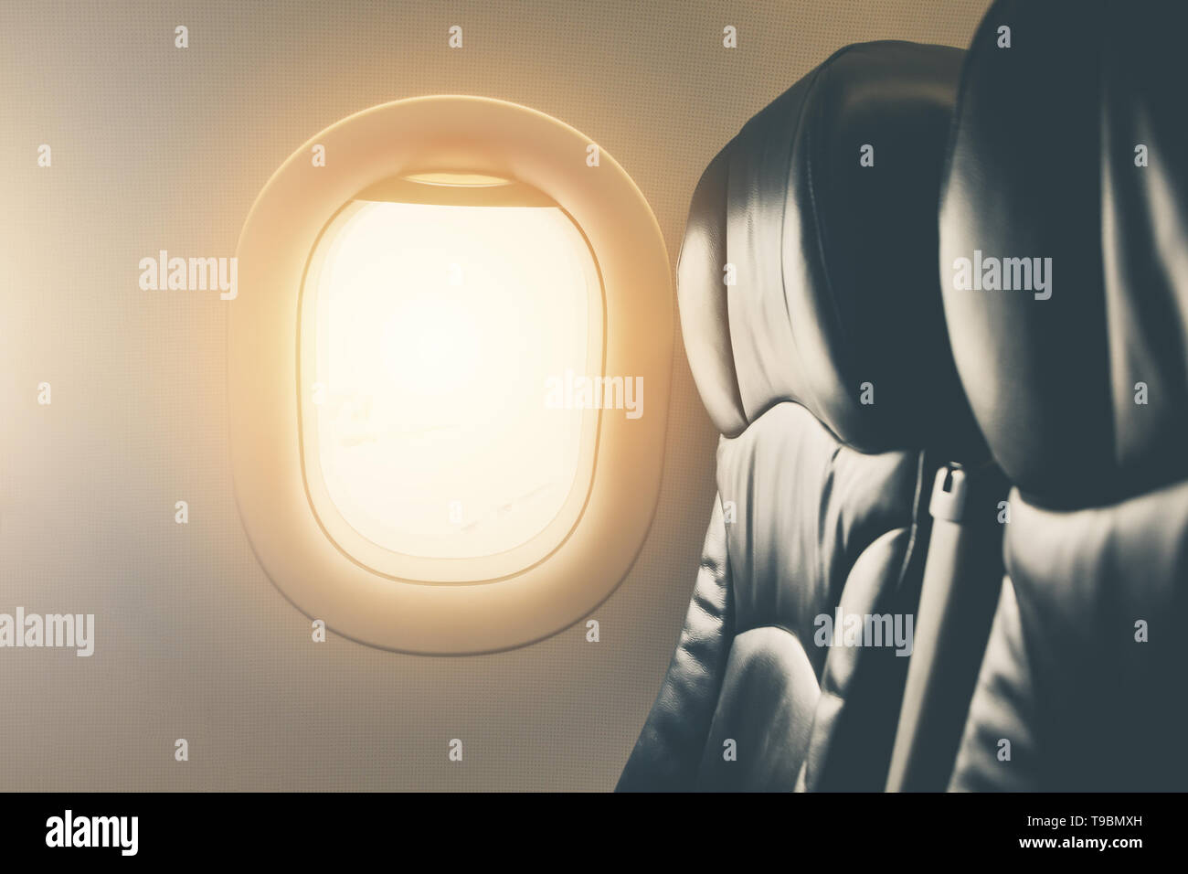 empty seat airplane window view inside an aircraft close up for flight background Stock Photo