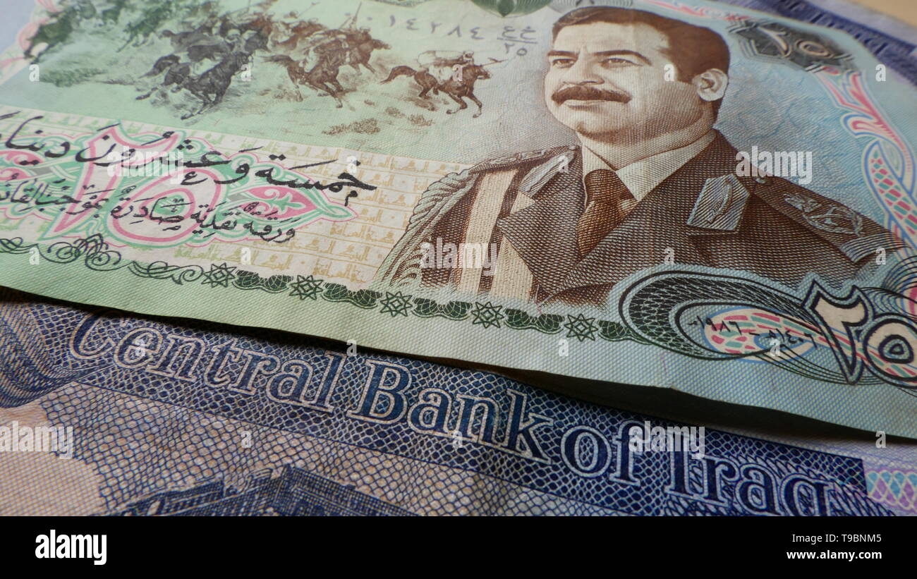 Old and new Iraqi Dinar banknotes Stock Photo