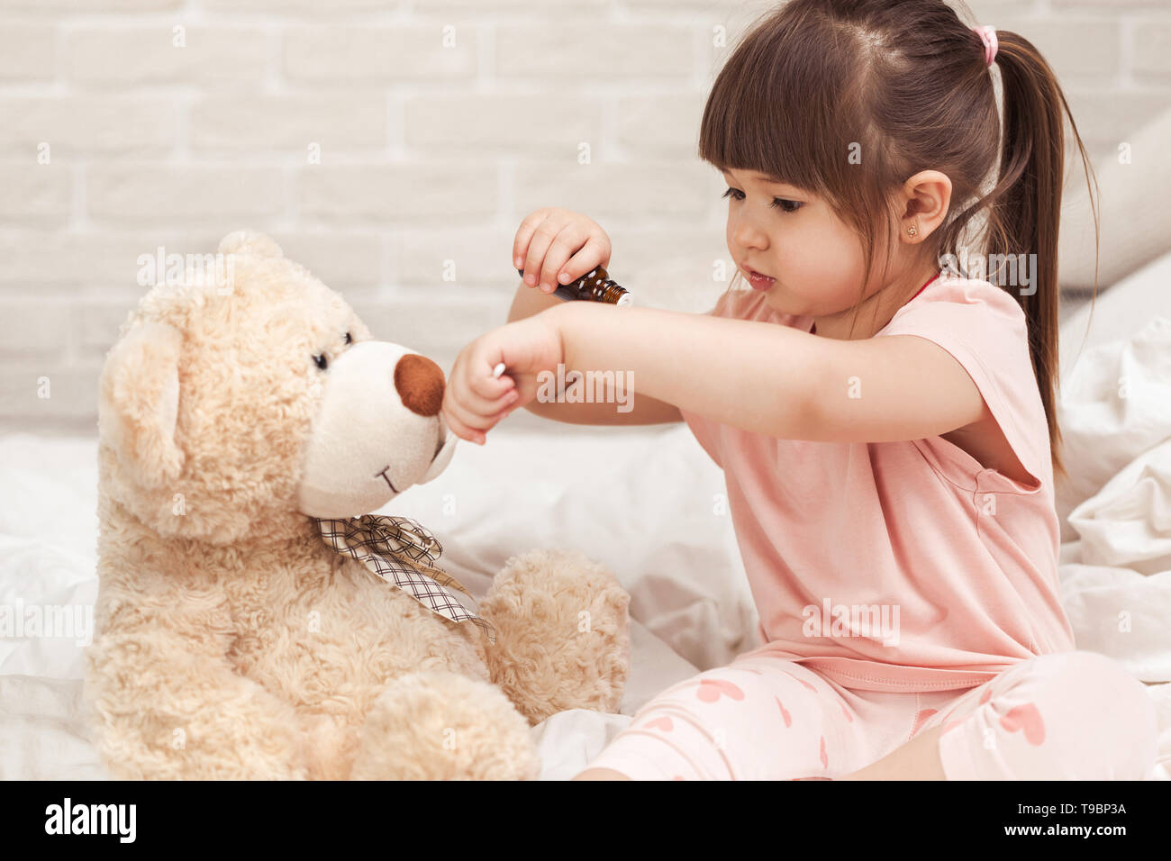 cute girl with teddy