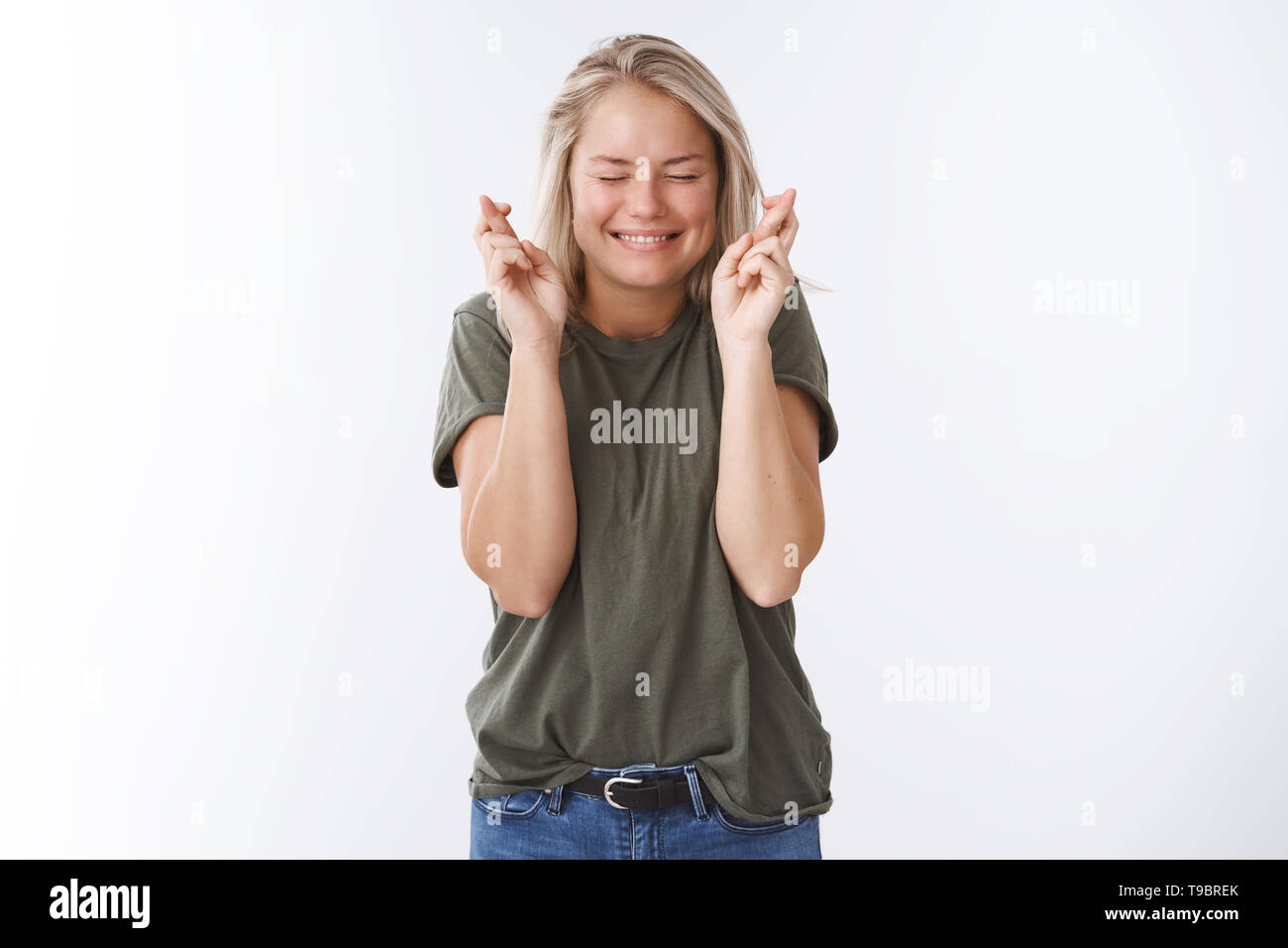 Wish Me Luck Excited Optimistic Attractive Woman Hope Today Boyfriend Make Proposal Crossing Fingers For Good Luck Smiling With Closed Eyes And Stock Photo Alamy