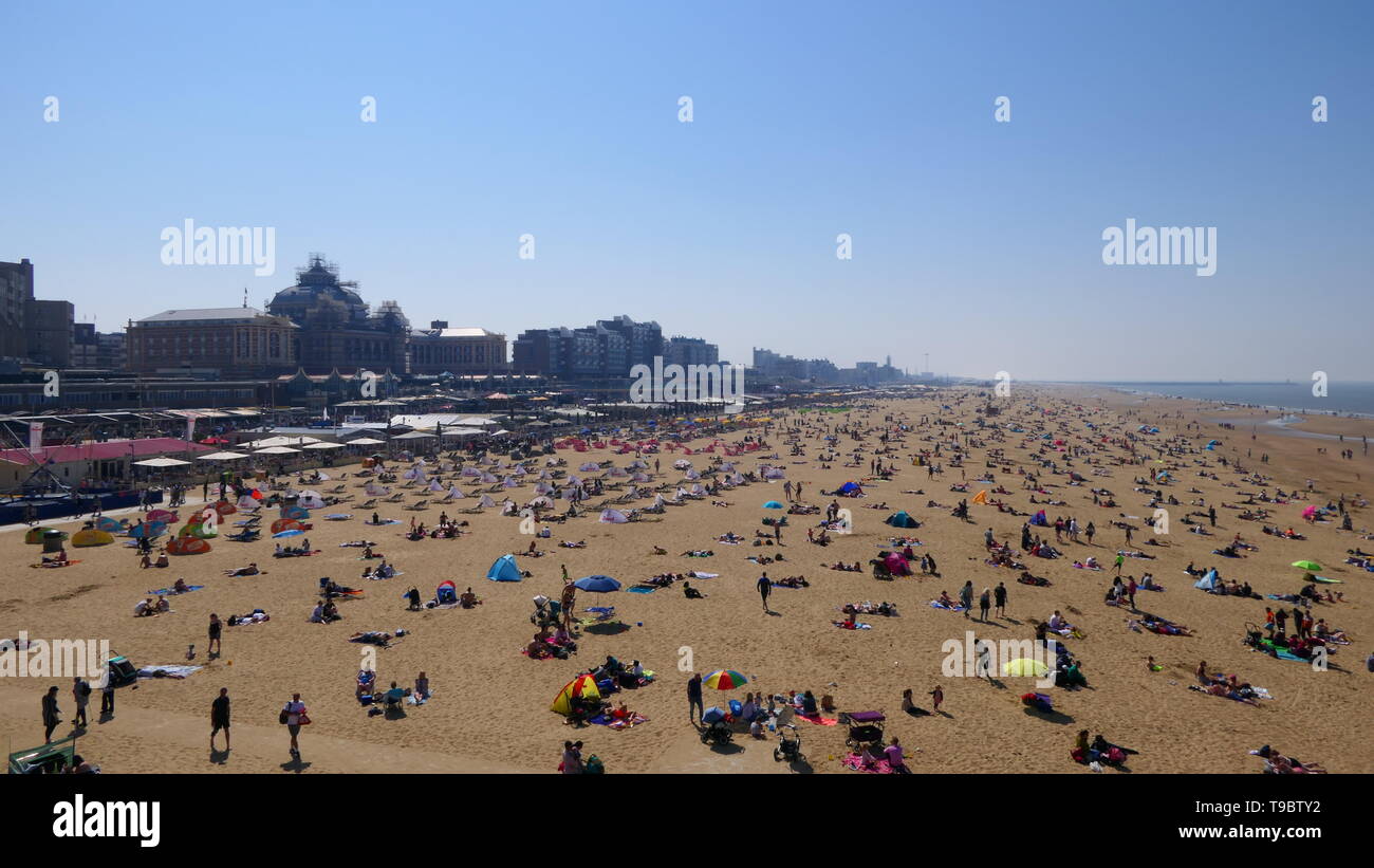 THE HAGUE, THE NETHERLANDS - APRIL 21, 2019: The beach of Scheveningen with the famous Kurhaus Scheveningen in the background Stock Photo