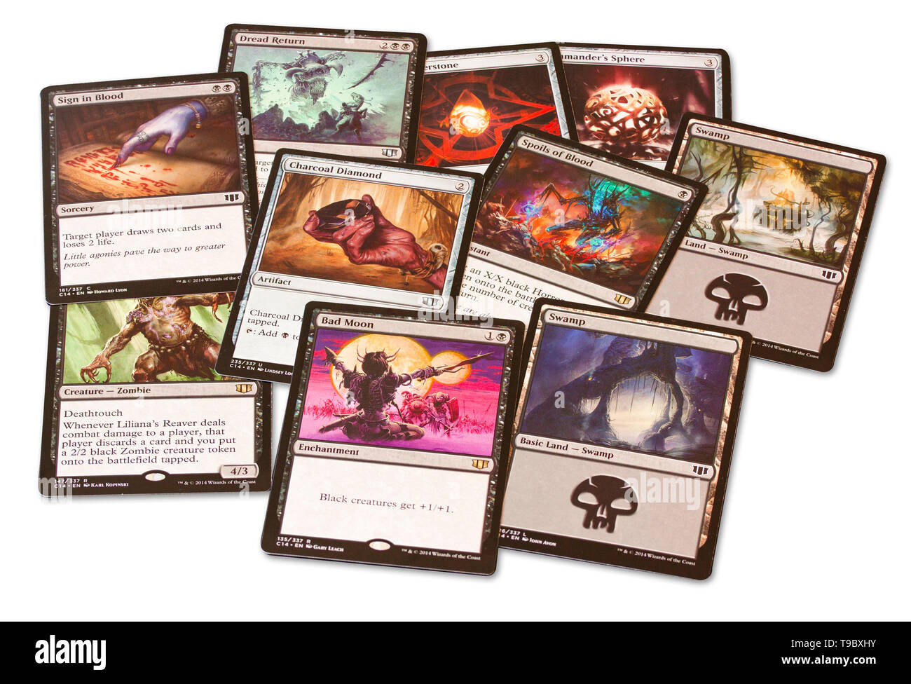 Cards of game Magic: The Gathering on white background. Magic can be played by two or more players in various rule formats. Stock Photo