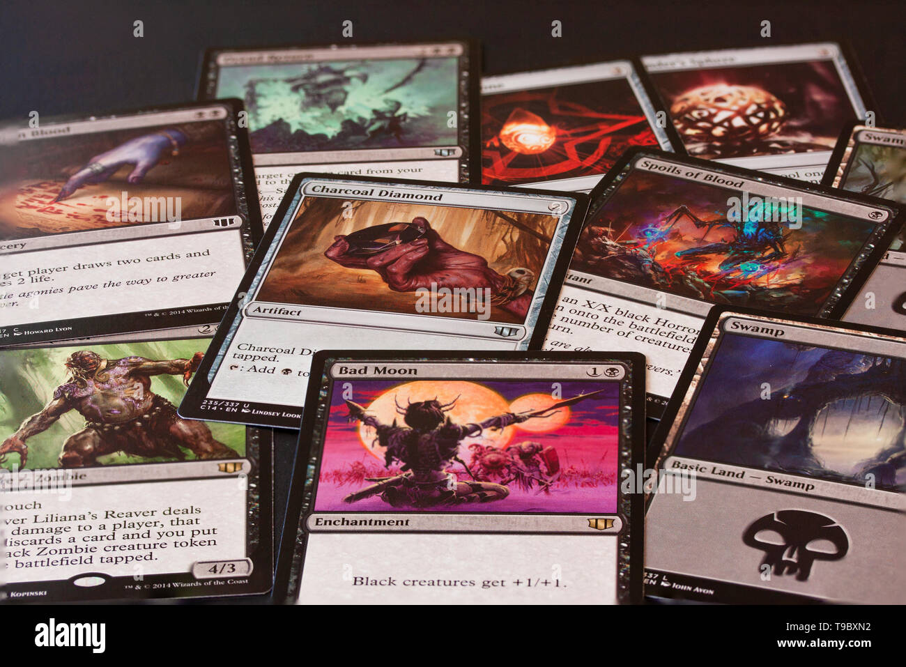 Cards of game Magic: The Gathering. Magic can be played by two or more players in various rule formats. Stock Photo