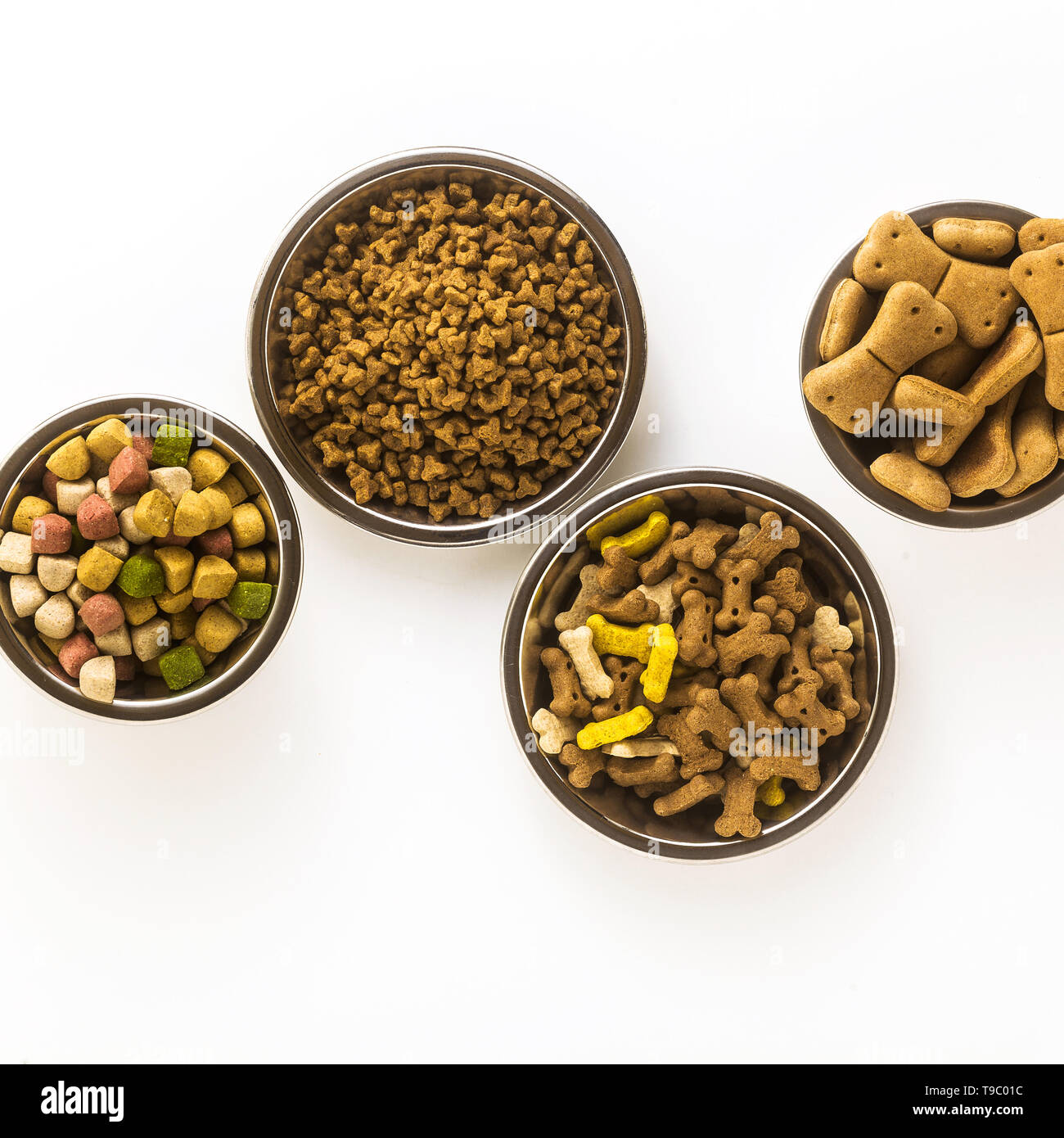 pet food in bowls and toys isolated on white background Stock Photo Alamy