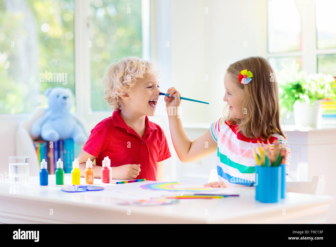 Kids Paint Child Painting In White Sunny Study Room Little Boy And Girl Drawing Rainbow School Kid Doing Art Homework Arts And Crafts For Kids Pa Stock Photo Alamy Kids Paint Child Painting In White Sunny Study Room Little Boy And Girl Drawing Rainbow School Kid Doing Art Homework Arts And Crafts For Kids Pa Stock Photo Alamy