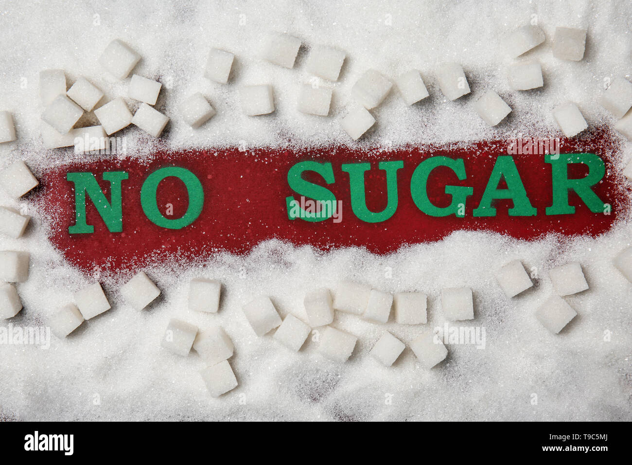 Composition with phrase NO SUGAR on color background Stock Photo