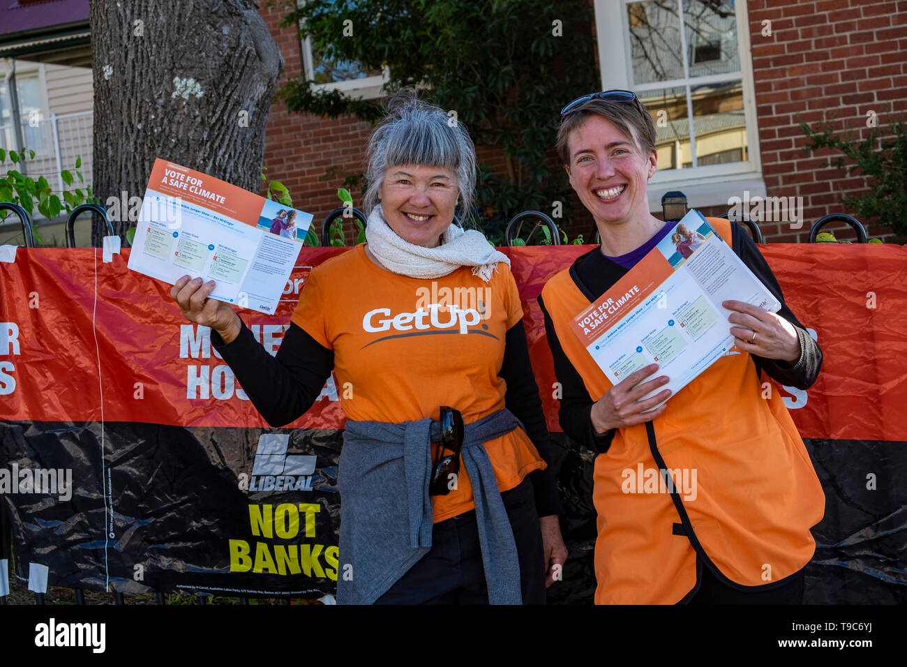 Volunteers with the political lobbying group, GetUp, handing out how to vote leaflets at a polling booth in West Hobart on election day, May 18 2019. Stock Photo