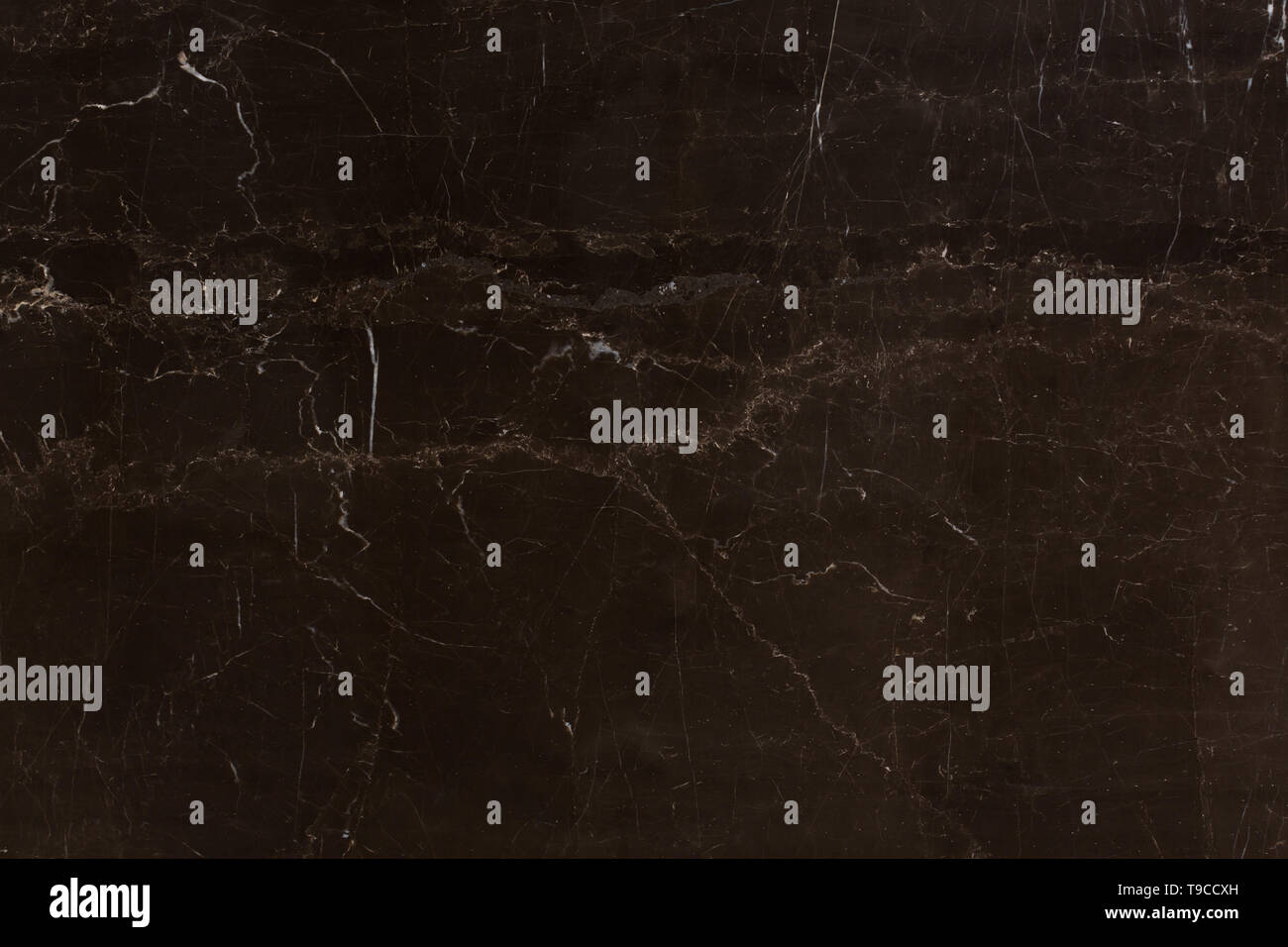 Dark brown natural marble stone texture with lines. Stock Photo