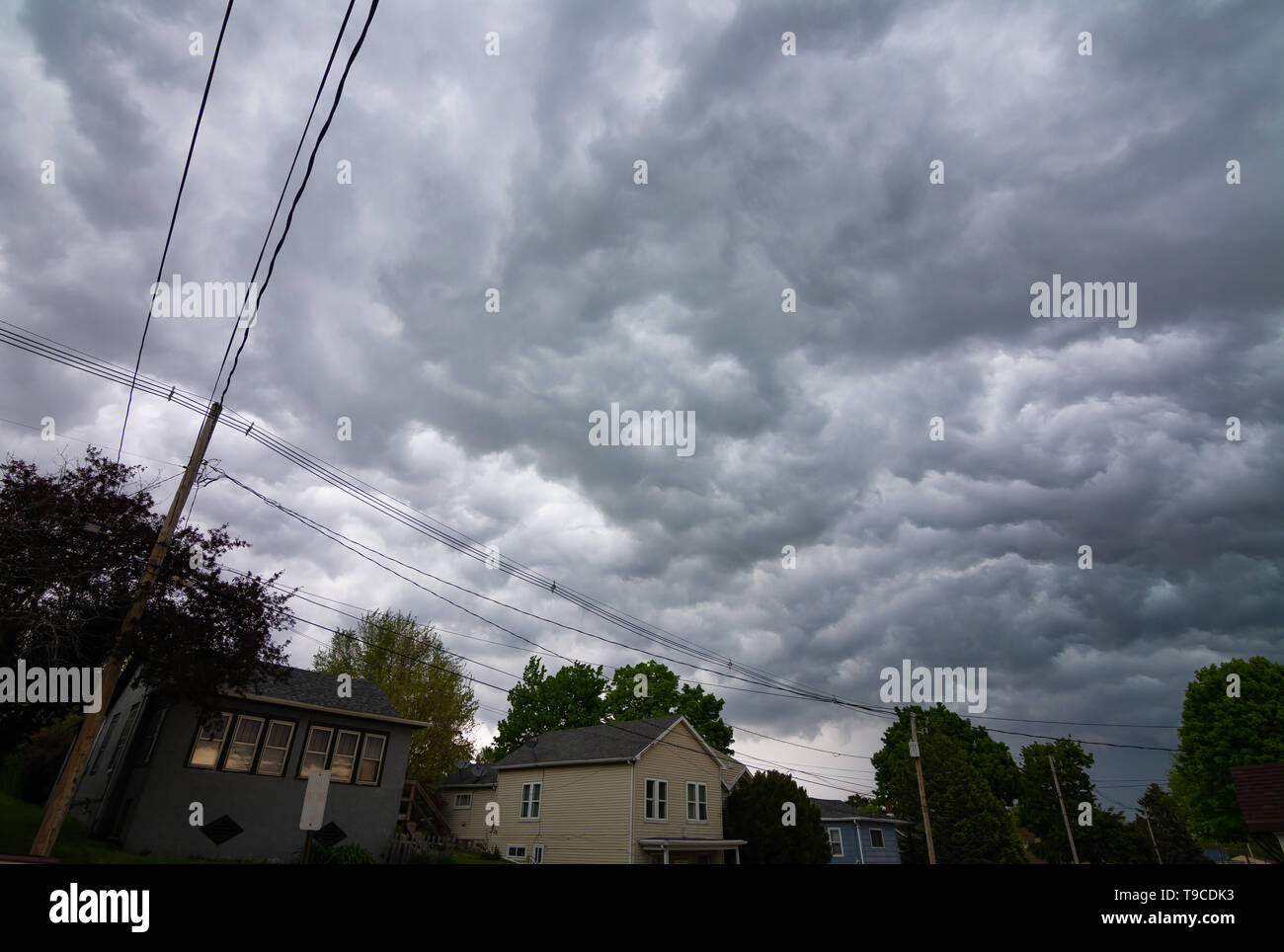 Dark thunderstorm clouds over small Midwest town Stock Photo - Alamy