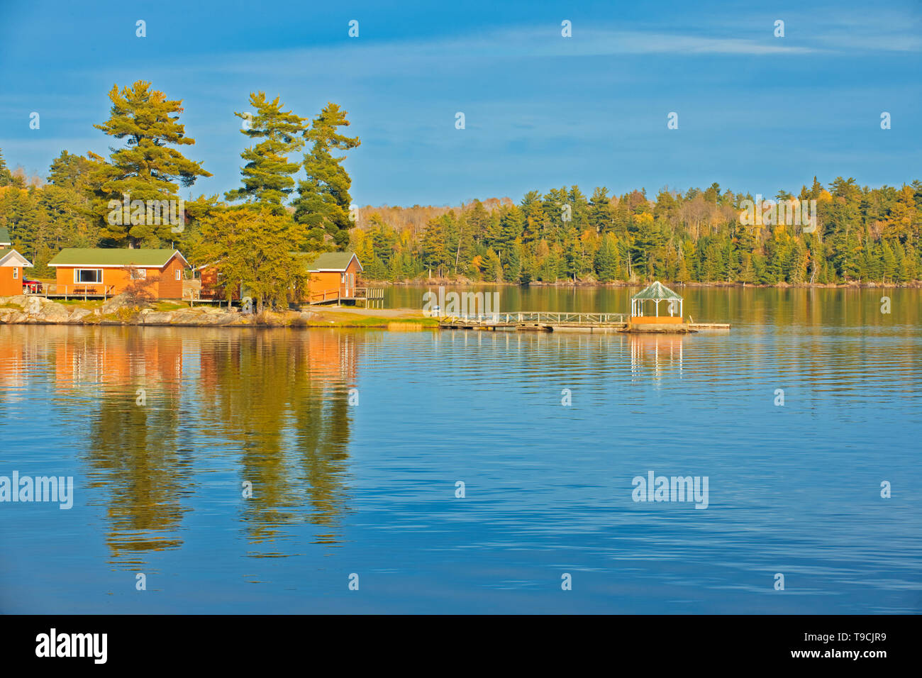 Cottages Reflected In Lake Of The Woods Sioux Narrows Ontario