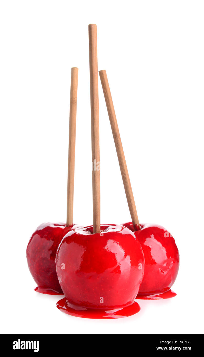 Delicious candy apples on white background Stock Photo Alamy