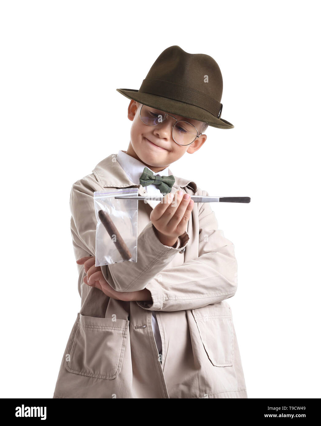 Cute little detective with evidence on white background Stock Photo