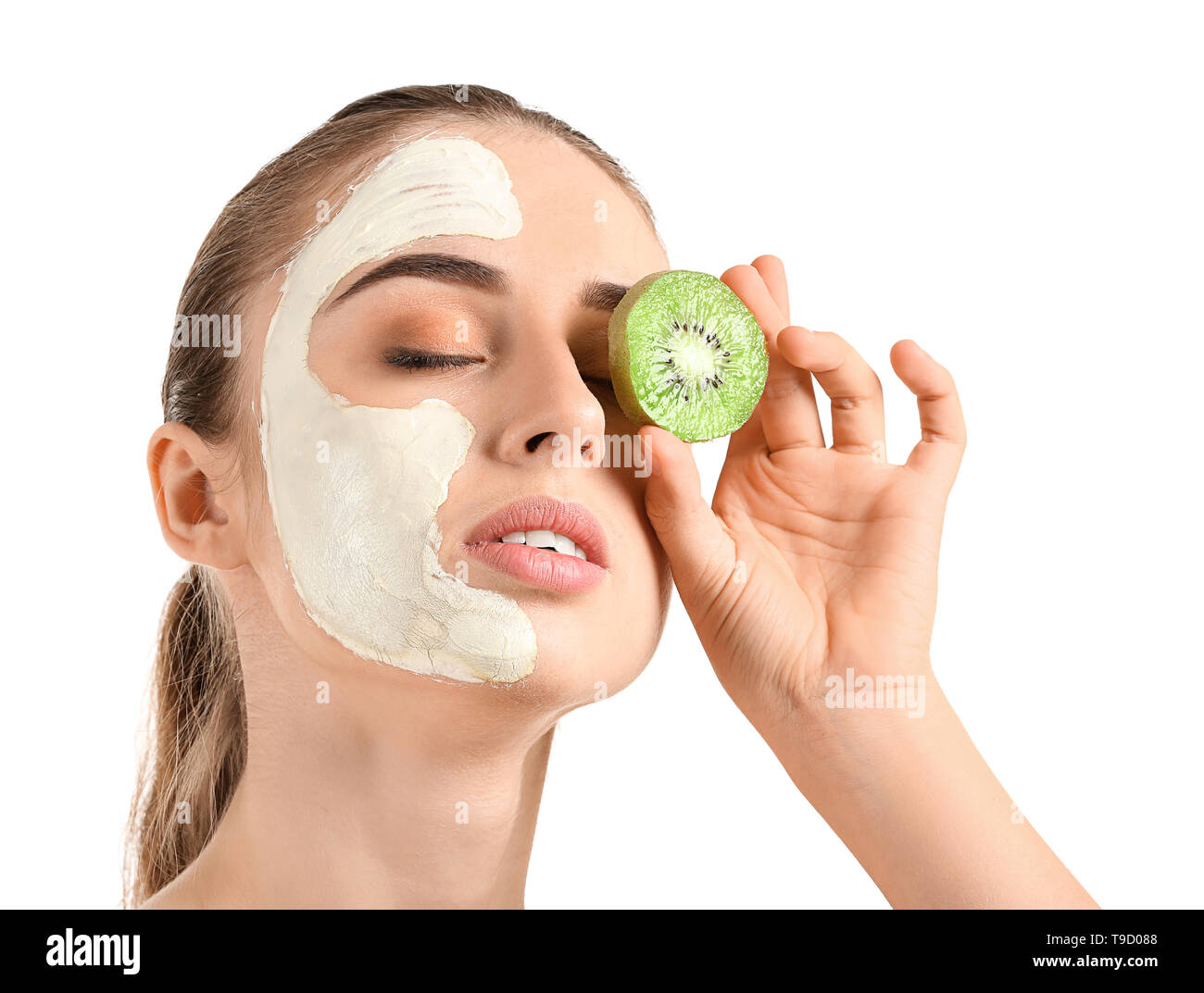 Beautiful Young Woman With Kiwi Facial Mask On White Background Stock Photo Alamy