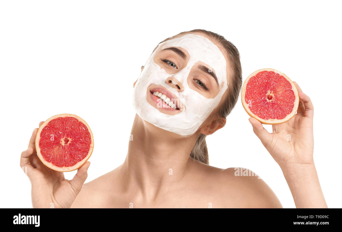 Download Beautiful Young Woman With Facial Mask And Grapefruit On White Background Stock Photo Alamy PSD Mockup Templates