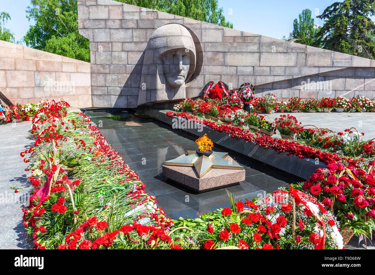 Samara, Russia - May 10, 2019: Memorial Complex and Eternal Fire on Glory Square and flowers in memory of the Victory in the Great Patriotic War Stock Photo