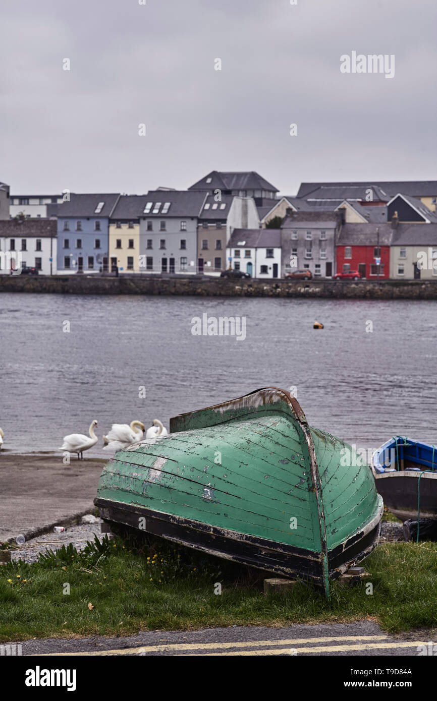 Upturned boat at the Claddagh area of Galway looking towards the Long Walk Stock Photo