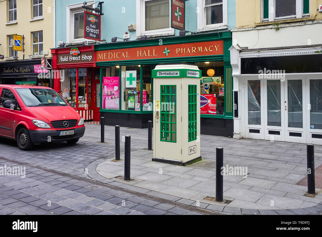 An old Irish phonebox now as a defibrillator unit in Killarney, Ireland Stock Photo