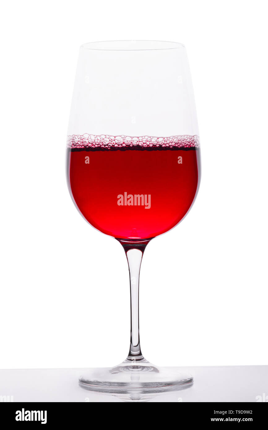 Glass of red wine on white background Stock Photo - Alamy